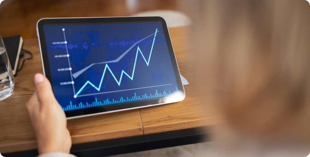 Tablet displaying upward trend graph.